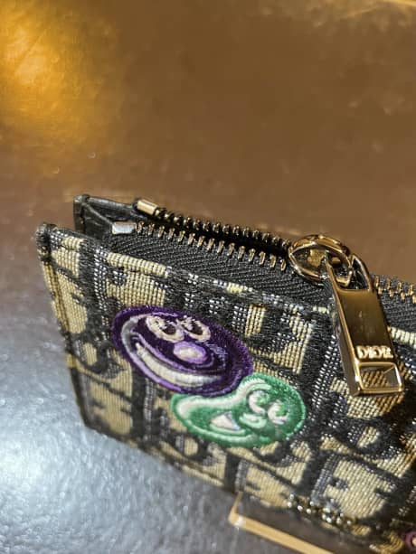 CHRISTIAN DIOR（クリスチャンディオール）フラグメントケース　ファスナー下留め金具取付け | 革小物修理